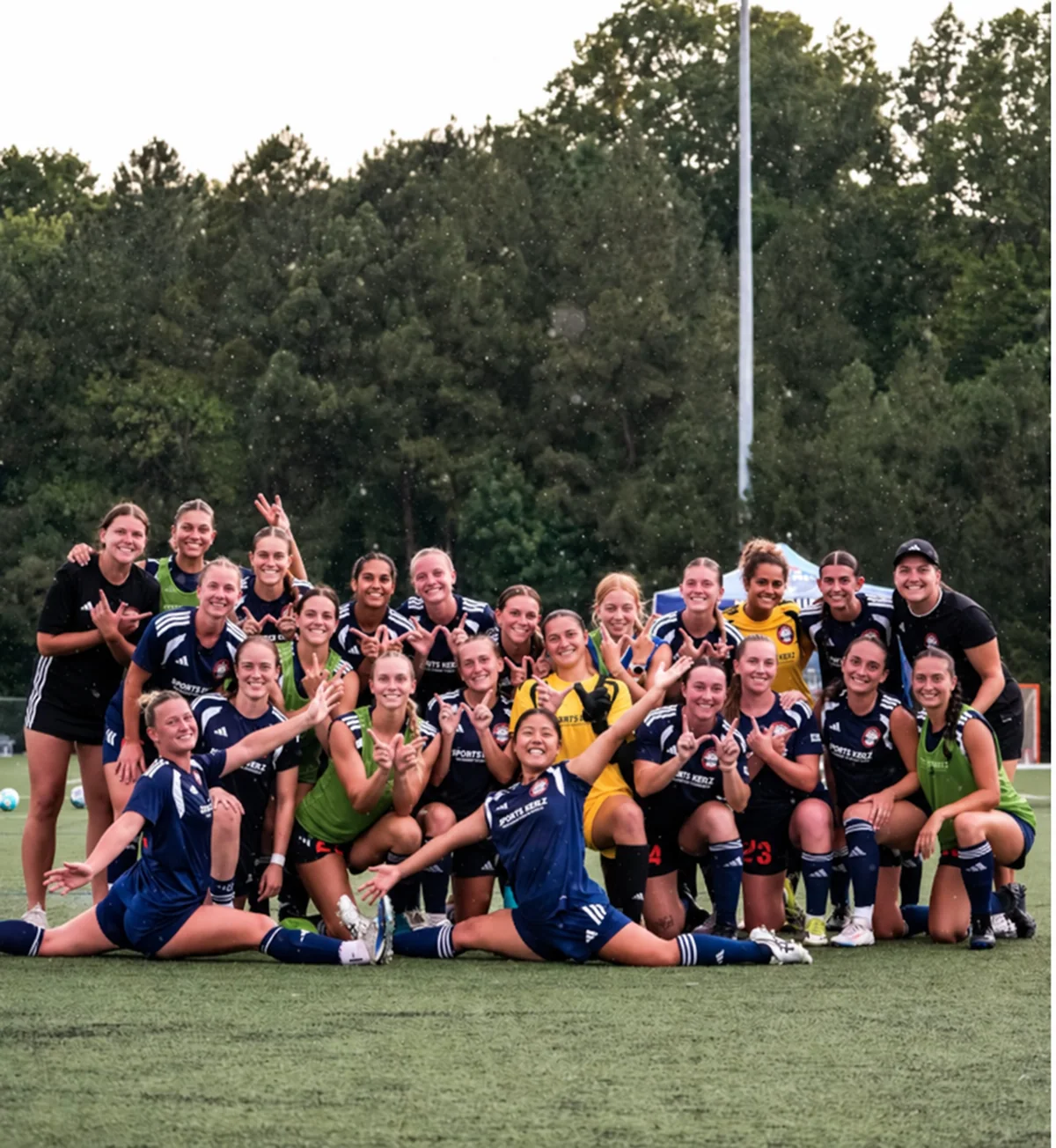 Lauren and the Charlotte Lady Eagles celebrating together on the field