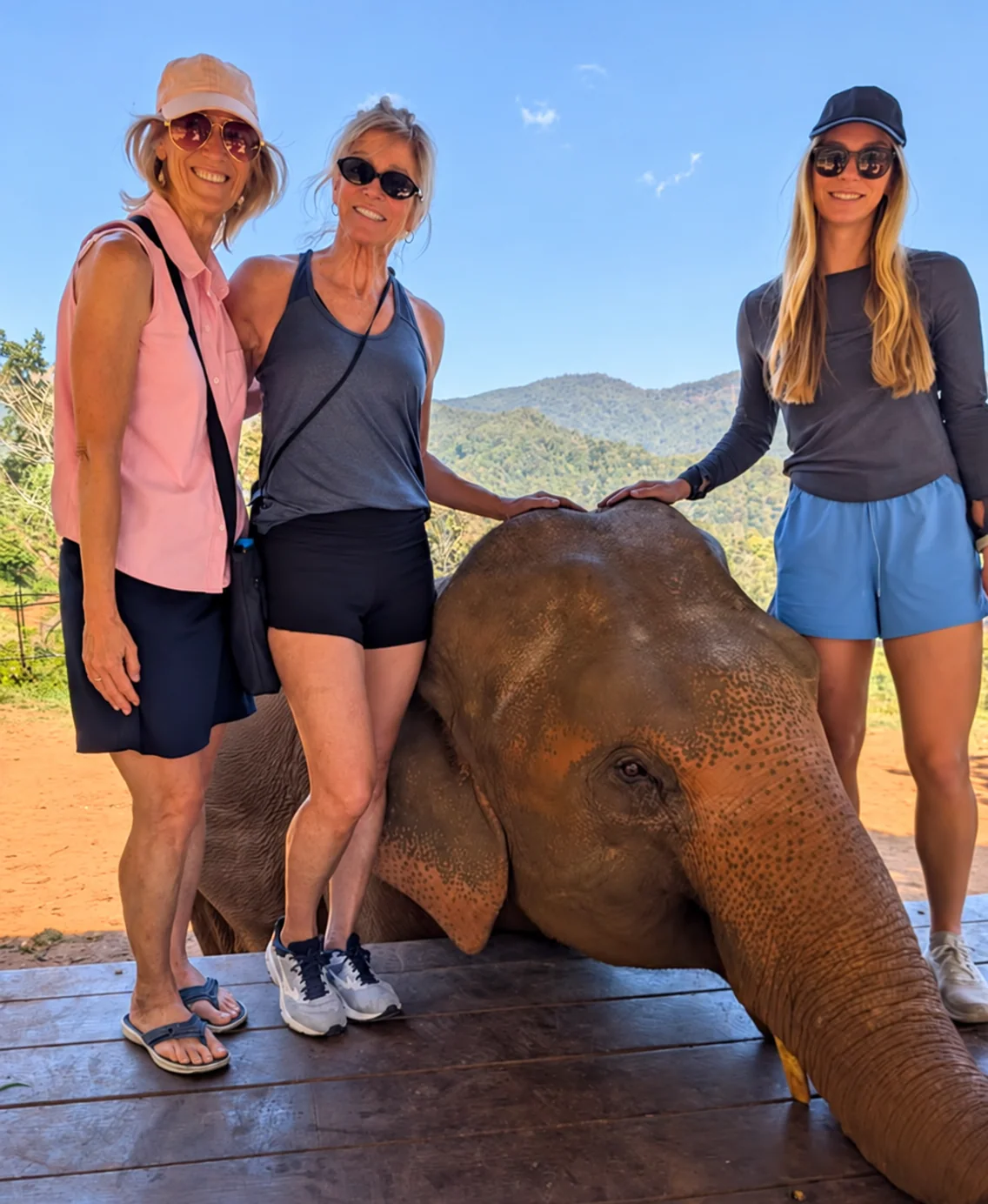Lauren standing with two women beside an elephant during her January 2026 visit to Thailand